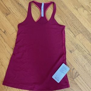 This tank top has never been worn before- comment if you have any questions!